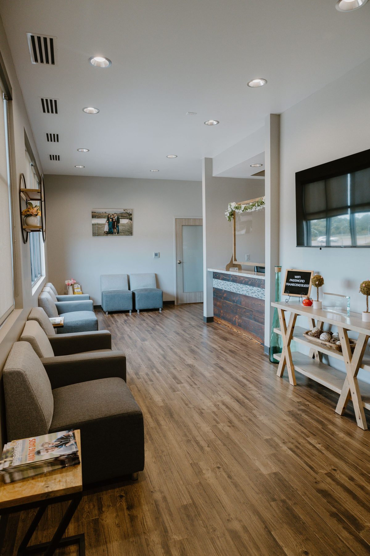 Patient waiting lounge with natural light and comfortable seating