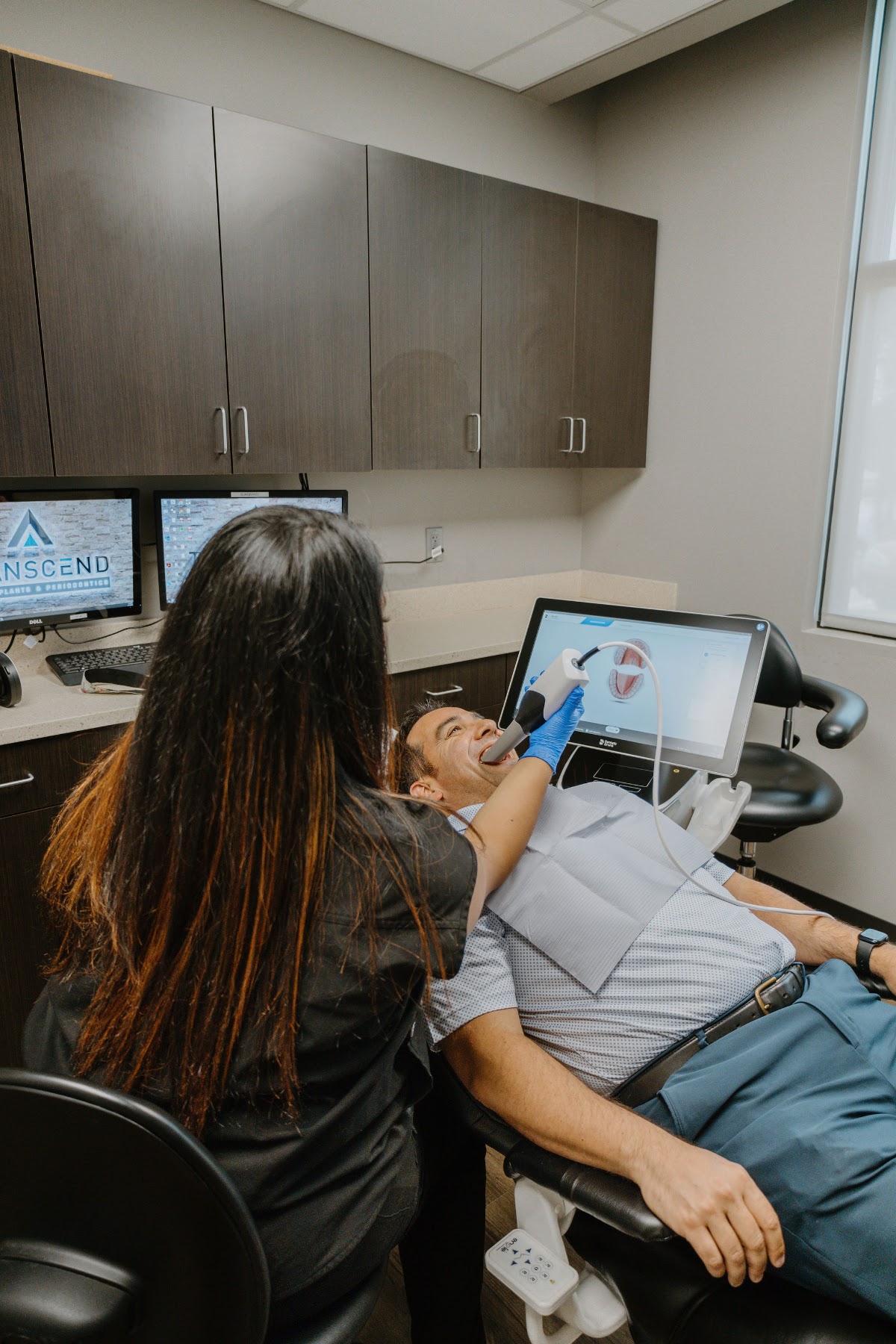 Transcend team reviewing a patient's imaging together chairside