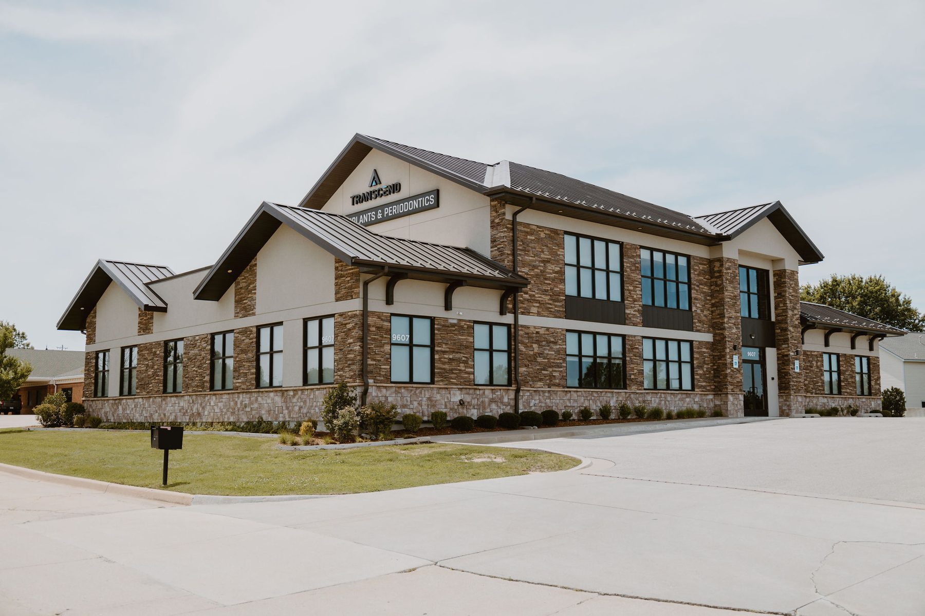 Angled exterior view of the Transcend Dental Implants & Periodontics building